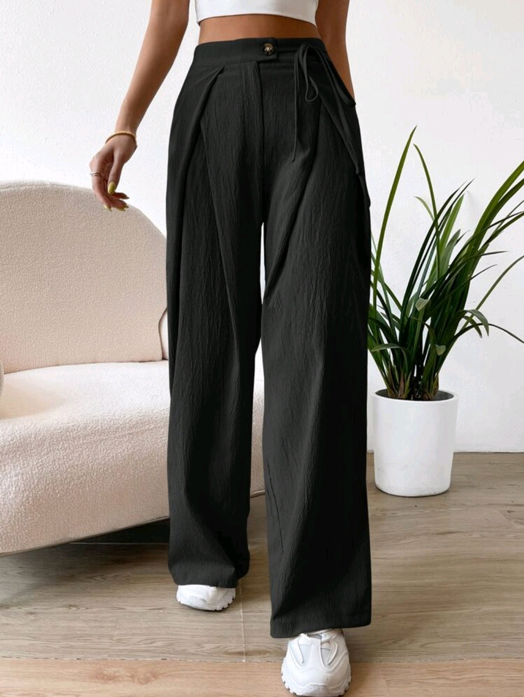 Pantalon à taille haute avec détails plissés et jambe large