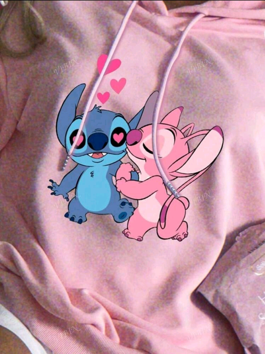Disney Sweat-shirt à capuche rose en coton à épaules tombantes pour femme, imprimé Stitch et Angie