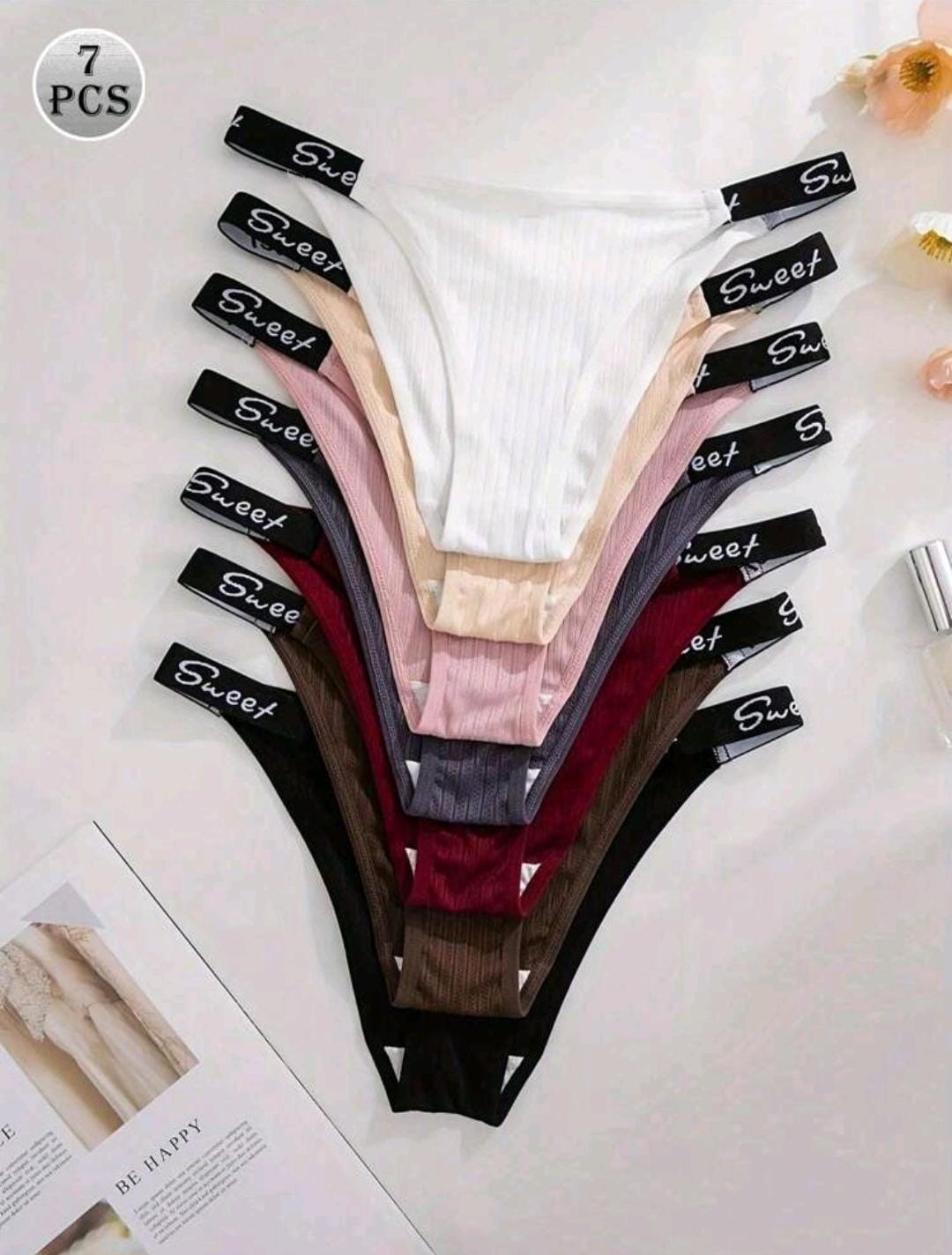 7 pièces de culottes taille basse pour femmes à bande de taille côtelée avec texte en anglais