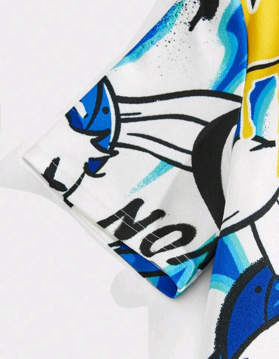 Manfinity RebelGame de t-shirt à manches courtes et short imprimé graffiti tricoté coloré