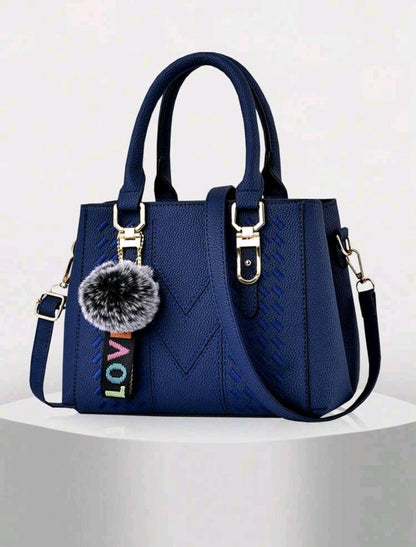 Nouveau sac à main d'épaule avec pendentif de boule de fourrure