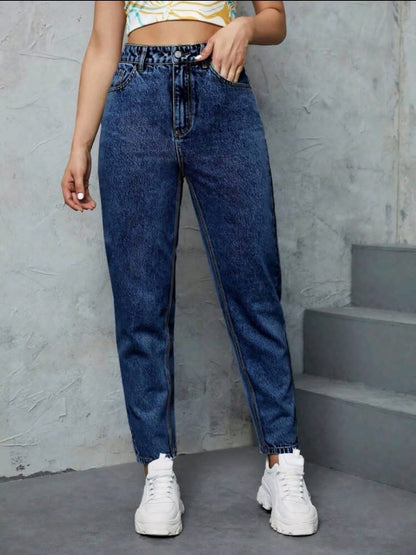 Jeans vintage effilés à taille haute lavés de manière décontractée