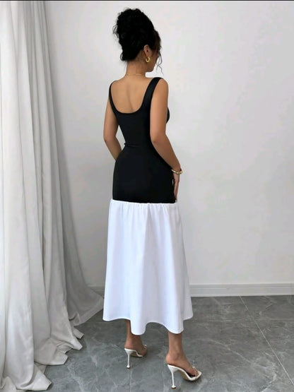 Rafferiza Robe de couleur noire et blanche ajustée avec encolure carrée