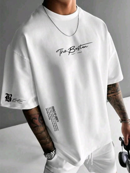 Manfinity Homme T-shirt décontracté à col rond et à manches courtes pour hommes avec lettre estampée pour l'été