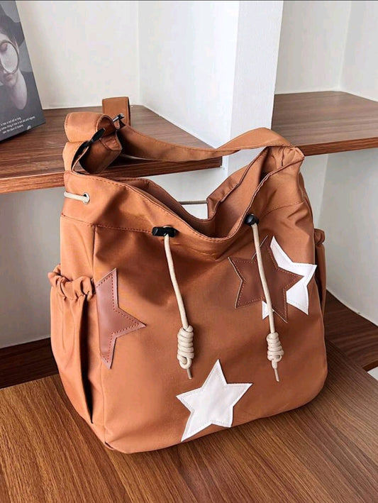 Nouveau sac fourre-tout de grande capacité avec décoration d'étoile à cinq branches en tissu de nylon de couleur unie